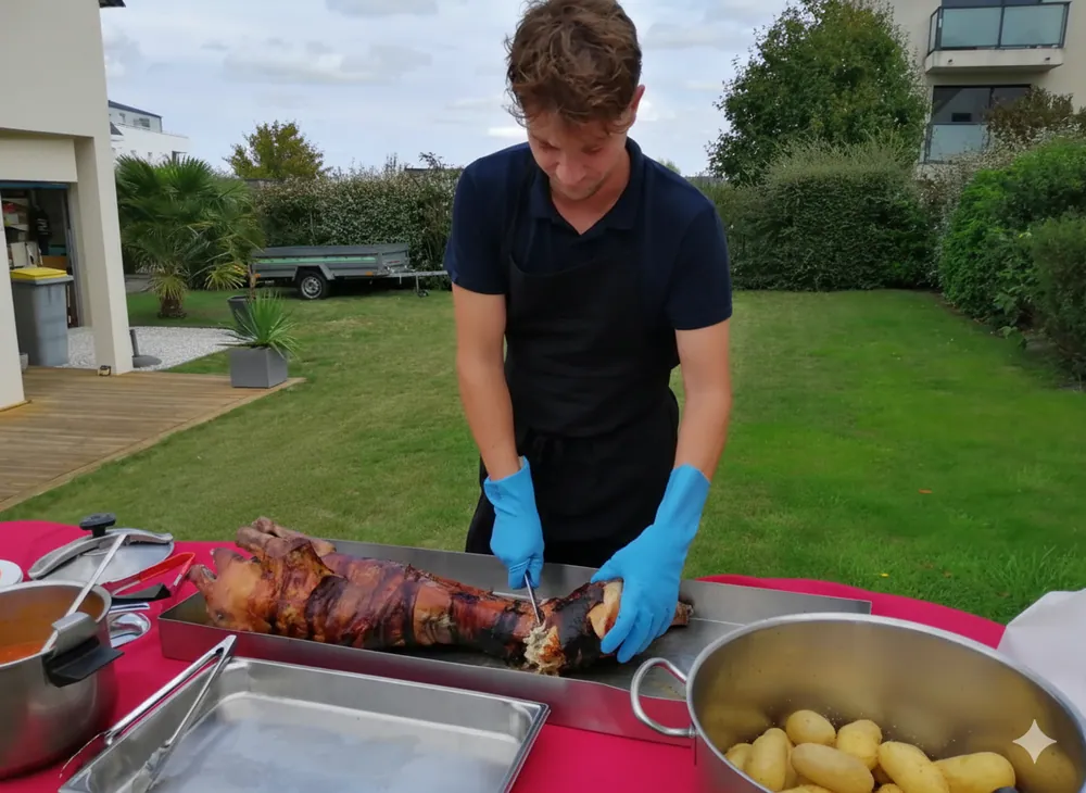 Découpe du cochon à la broche lors d’une réception en extérieur